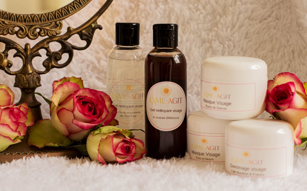 Photo of De Soleil et d'Amour's gel facial cleanser and facial mask jar, with a bespoke label that blends a colorful, luxurious color scheme with illustrations of sun rays, emphasizing the product's natural benefits;